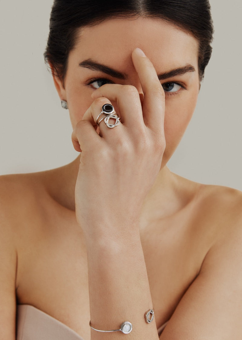 Black onyx & diamond ring in 18k white gold